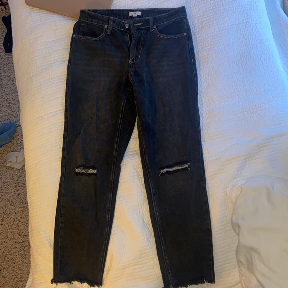 Urban Outfitters black ripped jeans. Never been worn. Size 29.
